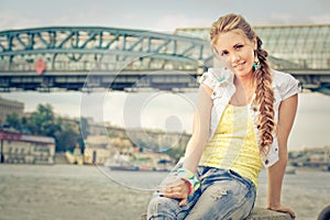 Girl near bridge over Moskow river
