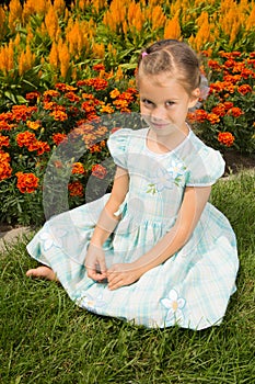 Girl Near Flowerbed