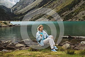 Girl near a french lake Gaube in the high pyrenees