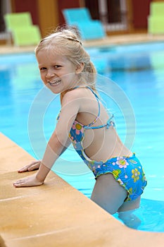 Girl near the open-air swimming pool