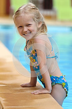 Girl near the open-air swimming pool