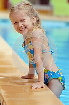 Girl near the open-air swimming pool