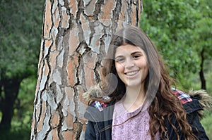 a girl near the pine tree make me smile