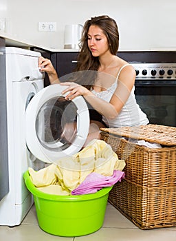 Girl near washing machine