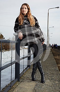 Girl near winter river