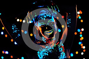 Girl with neon paint bodyart portrait