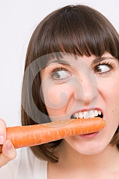 Girl nibble carrot