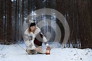 Girl in the night, winter forest