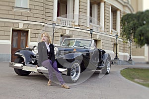 Girl in an old car