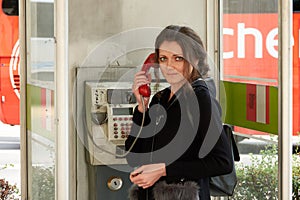 The girl in the old phone booth
