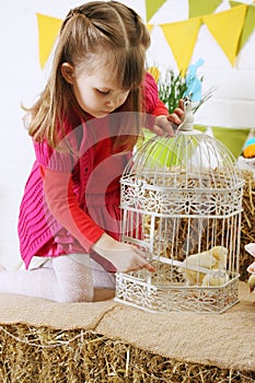 Girl opens the cage
