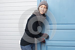 Girl opens door with keys