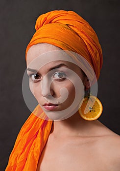 Girl with orange headscarf