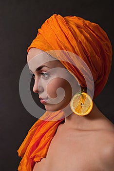 Girl with orange headscarf photo