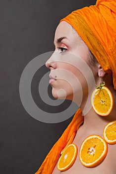 Girl with orange headscarf