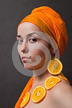 Girl with orange headscarf