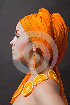 Girl with orange headscarf