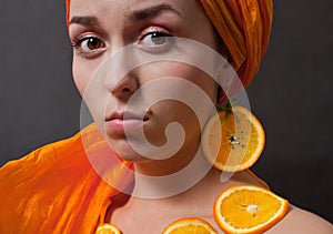 Girl with orange headscarf