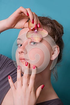 Girl with orhid flowers