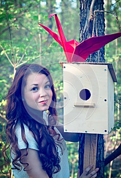 Girl with origami crane