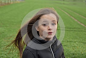 Girl outside in stormy weather