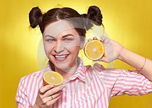 A girl over 30, on a yellow background with an orange, bright and beautiful. The yellow background color easily changes to another