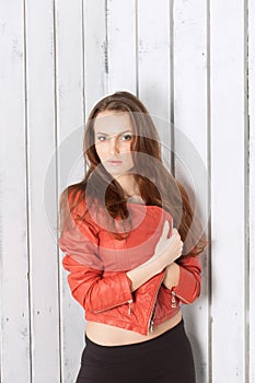 Girl over wooden white background