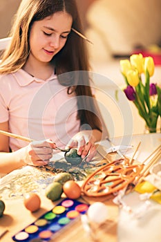 Girl painted Easter eggs