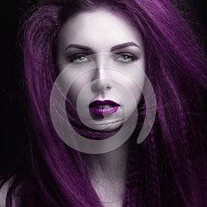 The girl with pale skin and purple hair in the form of a vampire. Insta color.