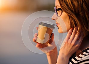 Girl with a paper cup