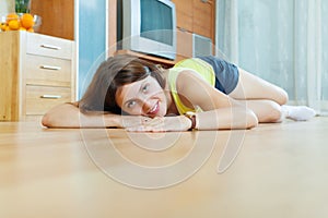 Girl on parquet floor