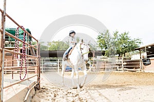 Girl Participating In Equine Therapy Program