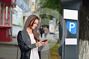 Girl pays for parking via mobile application