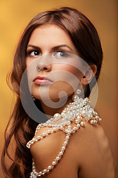 Girl with pearls necklace