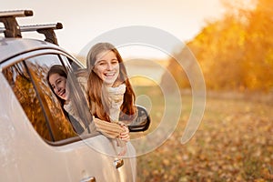 Girl peeking out car window