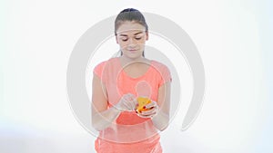 Girl Peeling an Orange