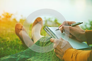 Girl with pen writing