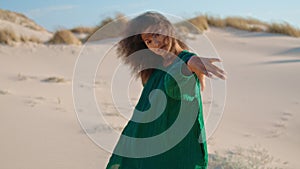 Girl performer dancing desert at summer close up. Woman moving body sensually.