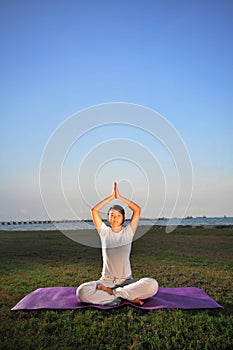 Girl performing Yoga - 1