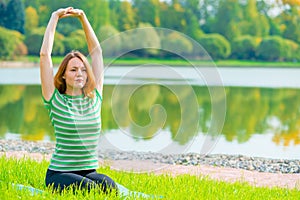 Girl performs stretching exercises back muscles