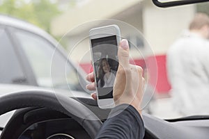 The girl and the phone in the car