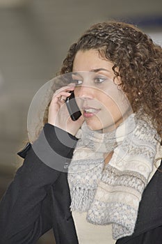 Girl phoning in train station