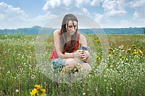 Girl picking flowers