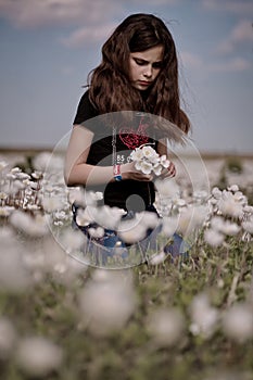 Girl picking flowers