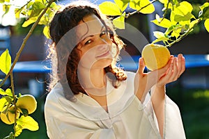 Girl picking up fresh fruit