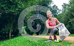Girl picking up trash doing plogging