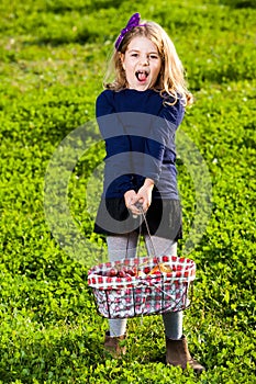 Girl picnic basket fruits