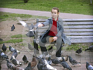 Girl and pigeons