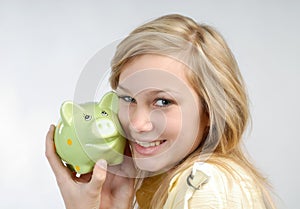 Girl with piggy bank