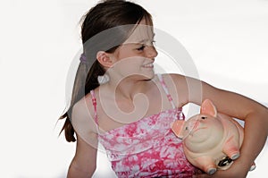 Girl with piggy bank